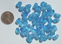 50 10mm Blue Givre Twisted Oval Glass Beads